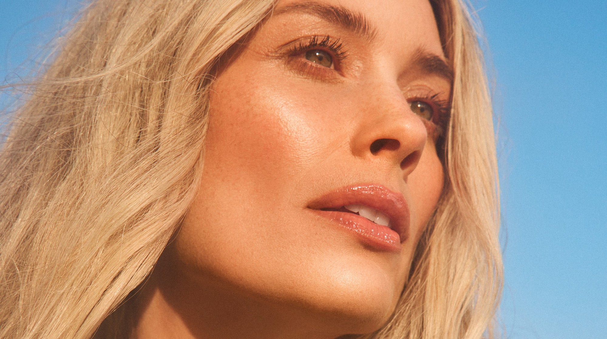REL Beauty Close up of Glossy Lip Oil on Arielle Vandenberg