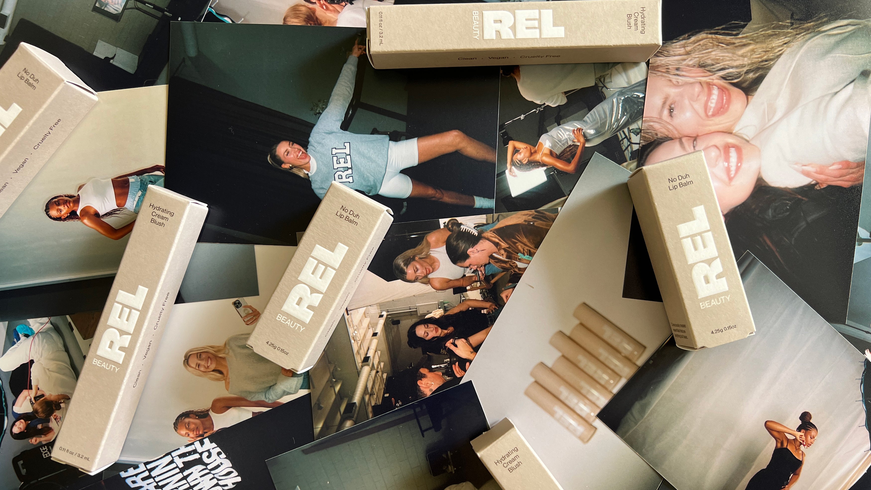REL Beauty Lay down photo of all products and BTS photos